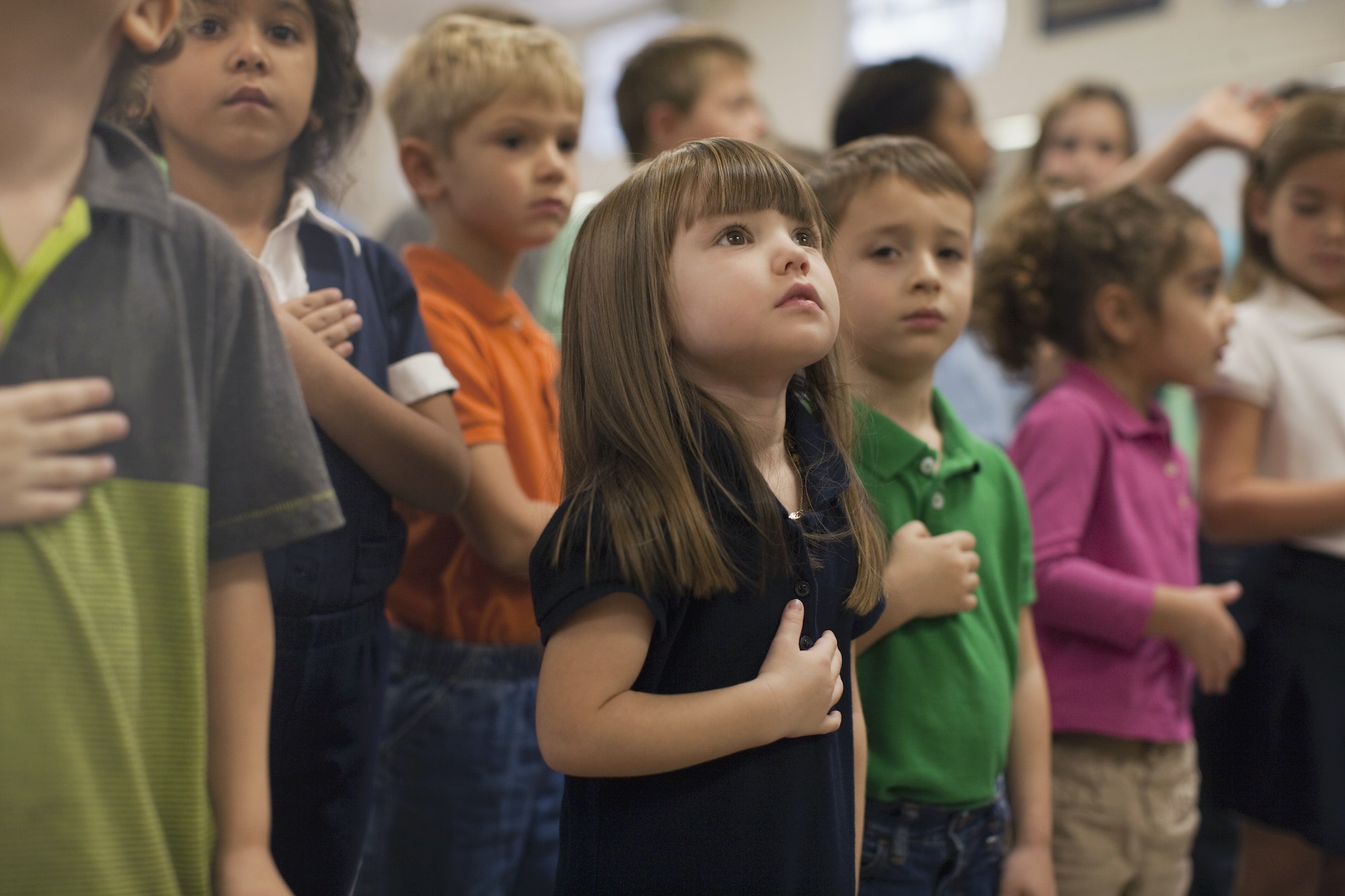 Children reciting Pledge of Allegiance in school